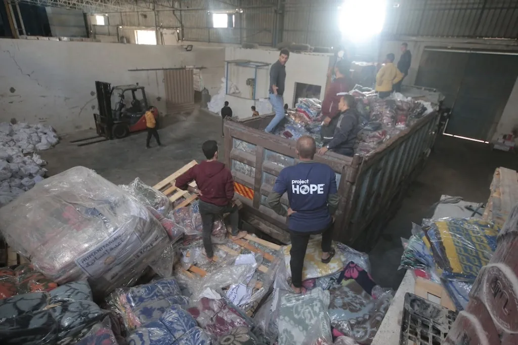 men loading truck