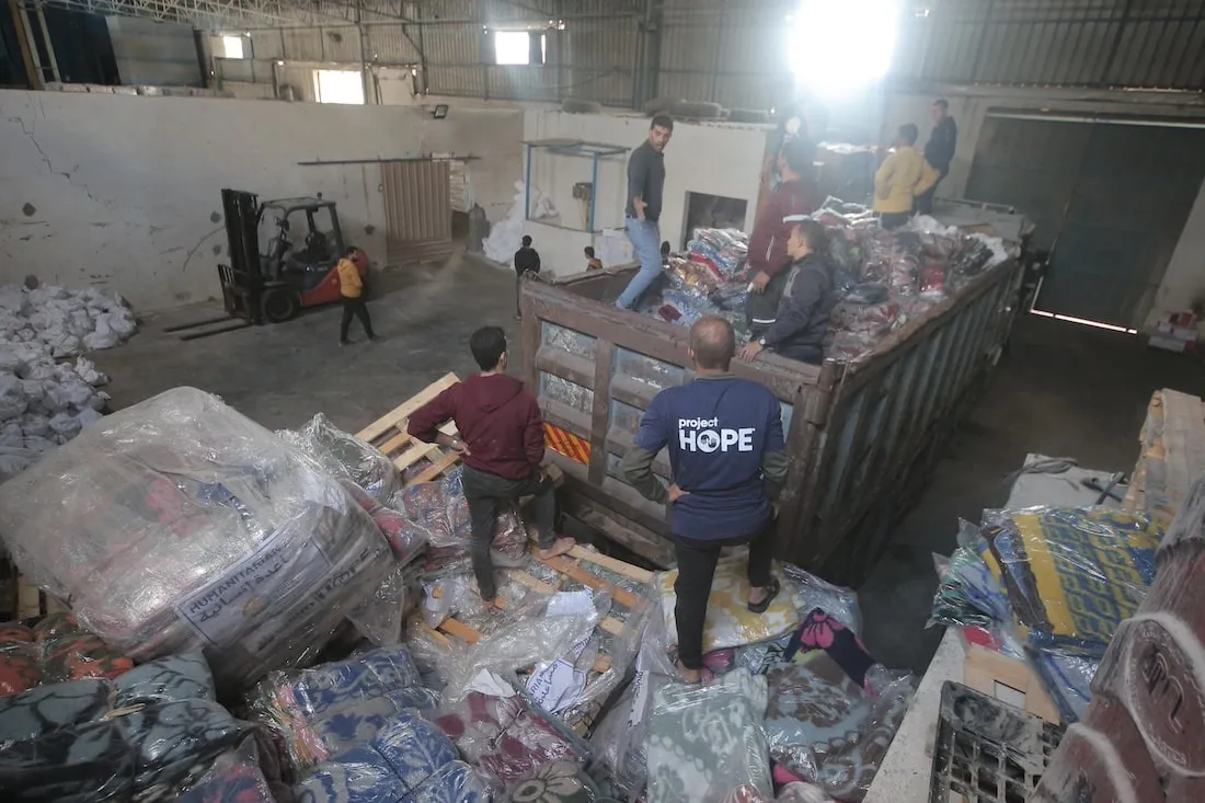 men loading truck
