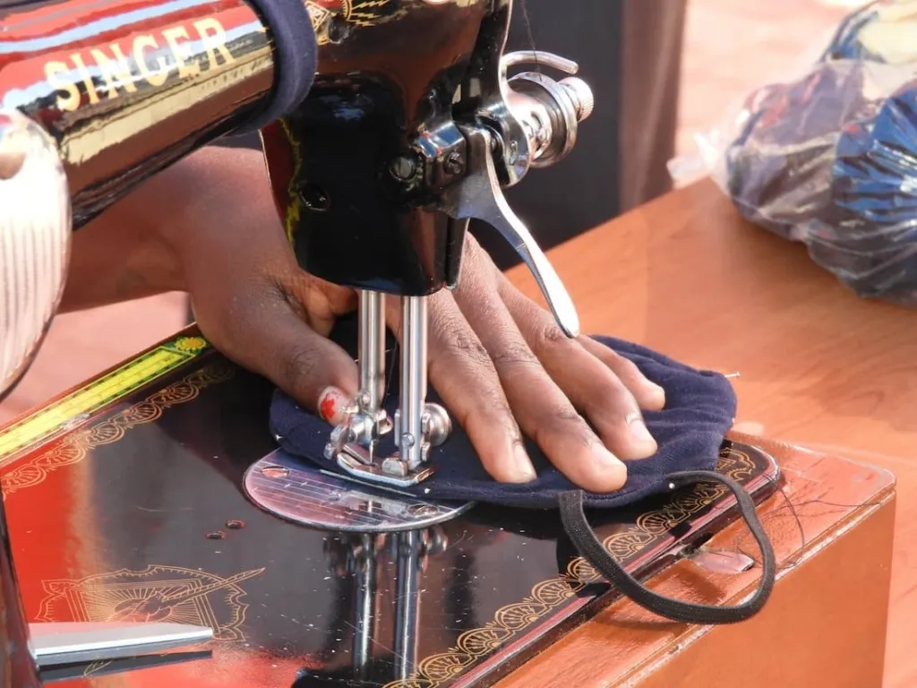 closeup of sewing machine making facemasks