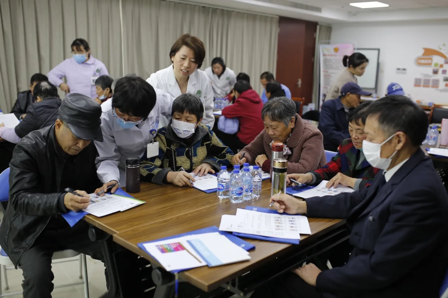 medical staff helping patients in China