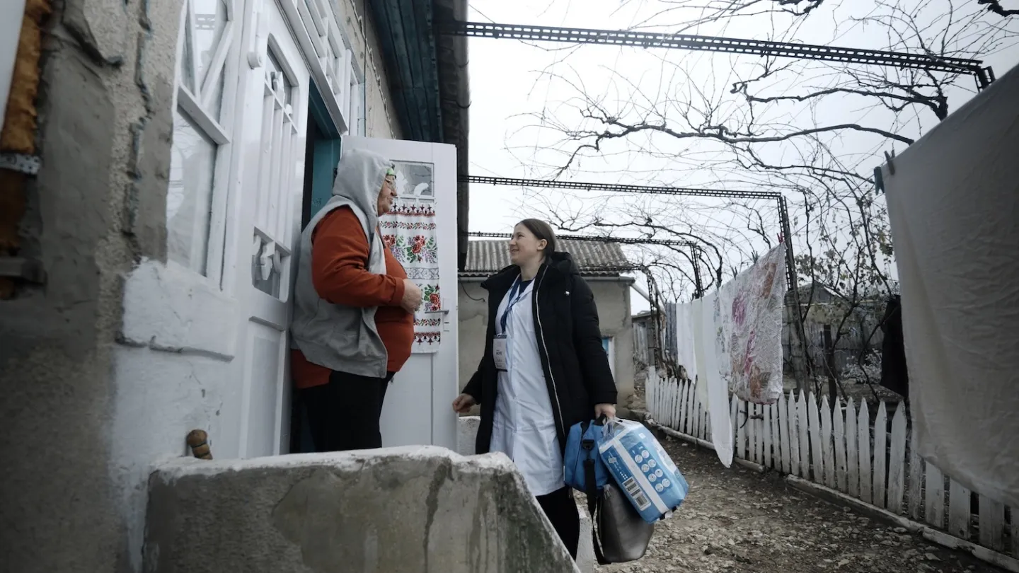medical staff checks in on patient at their home in Ukraine