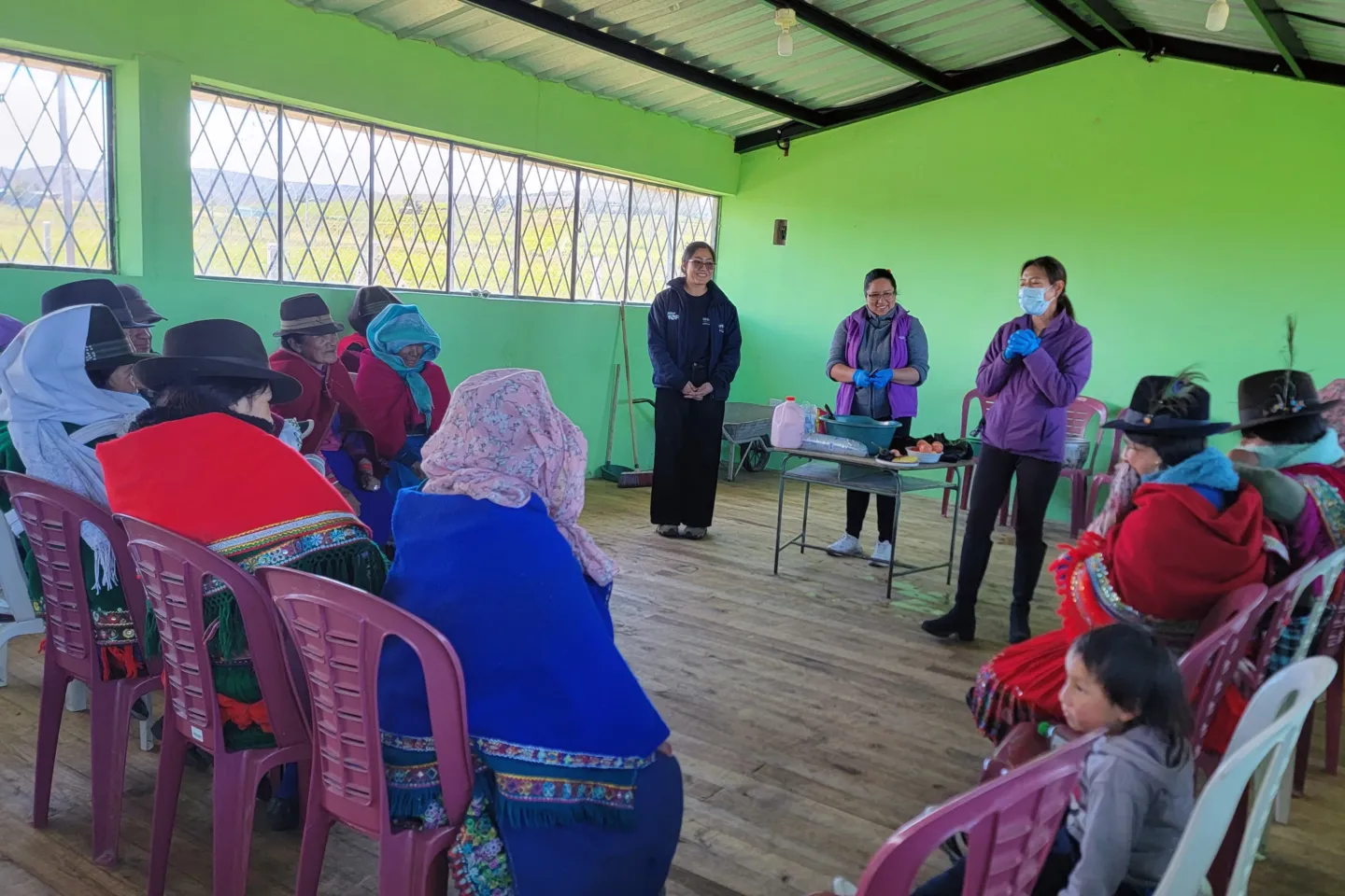 group sitting together for a training in Ecuador